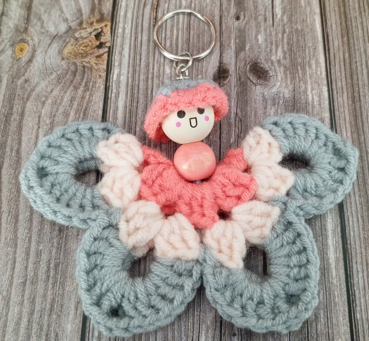Porte clé papillon gris/rose/saumon