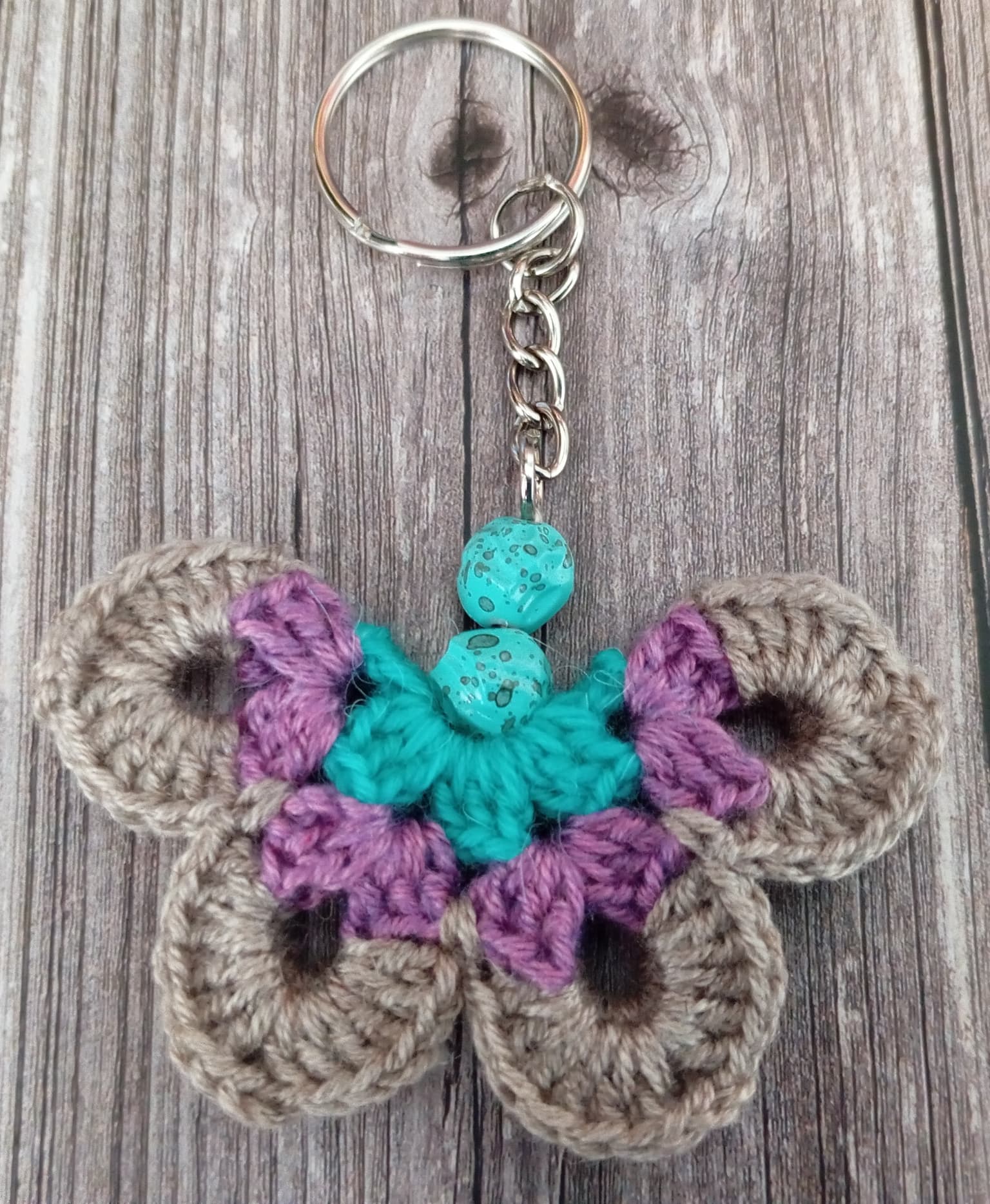 Porte clé papillon marron/violet/bleu