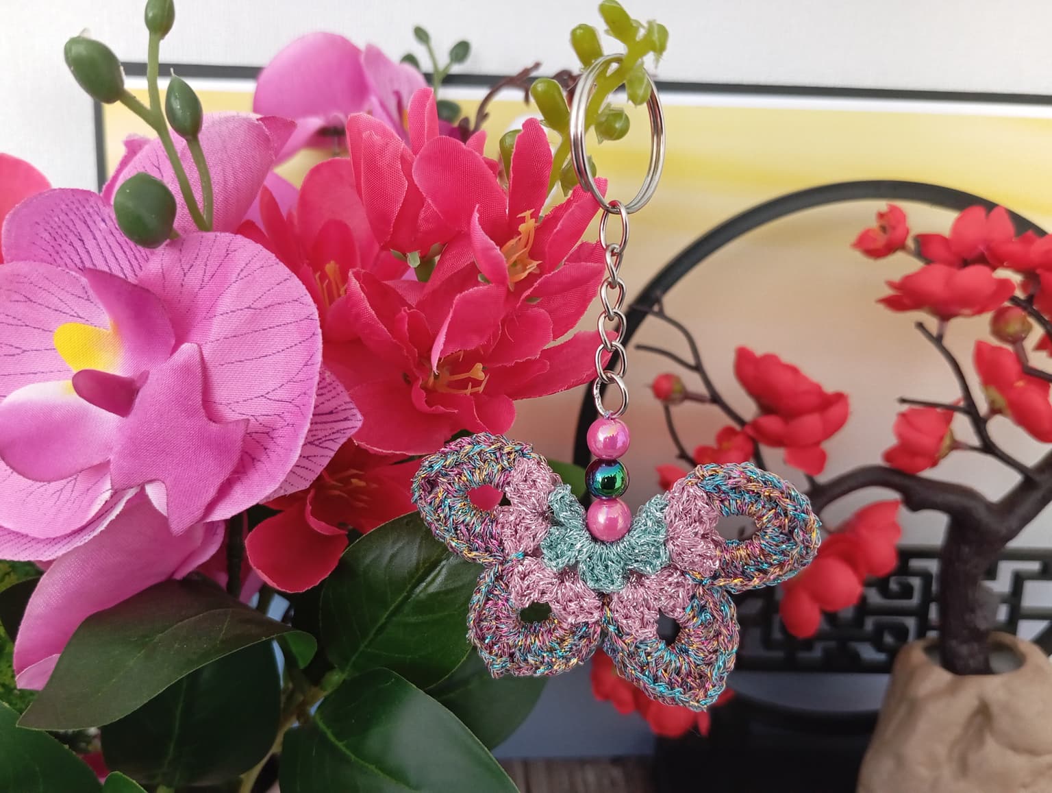 Porte clé papillon multicolore/rose/vert
