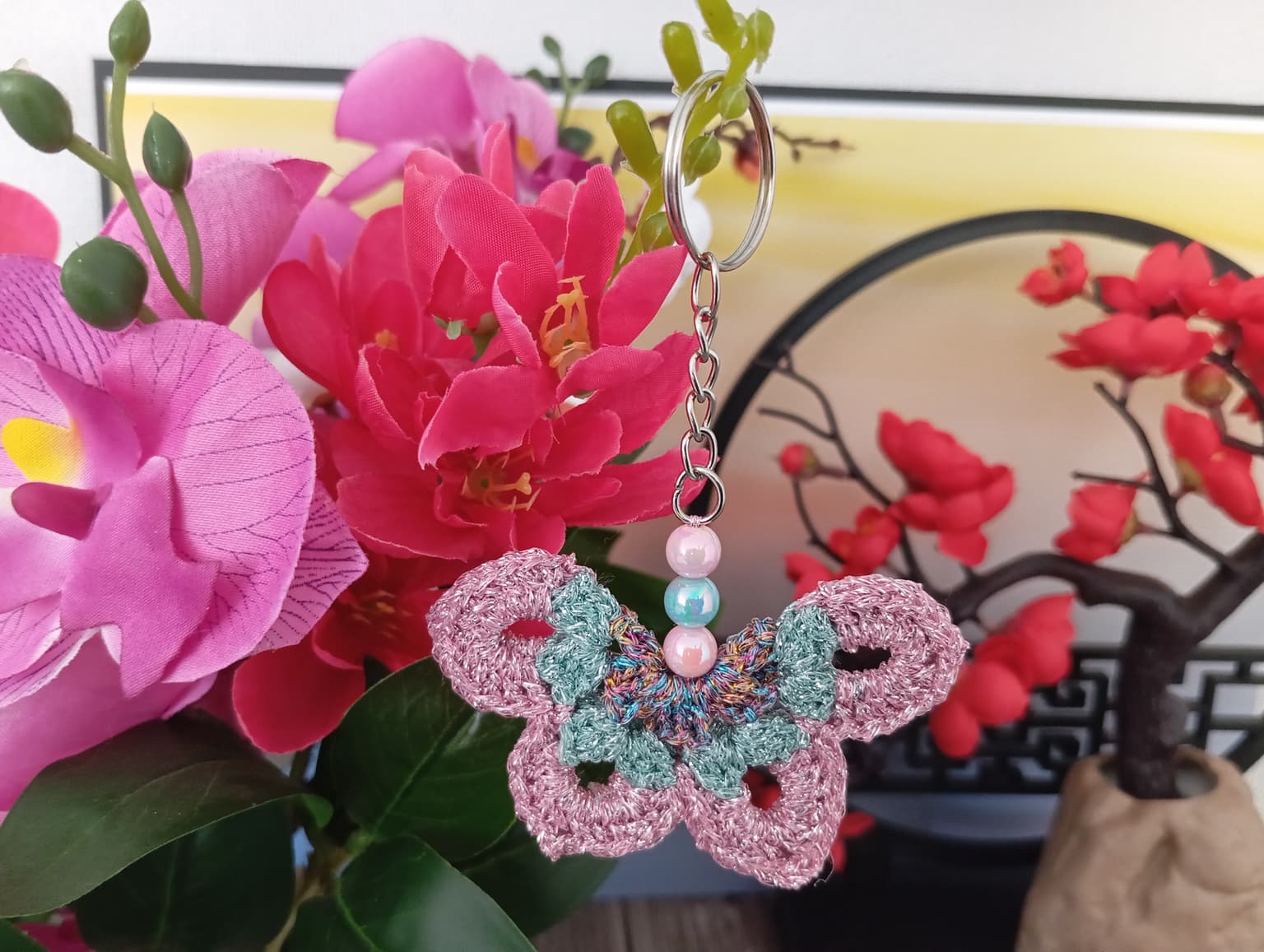 Porte clé papillon rose/vert/multicolore