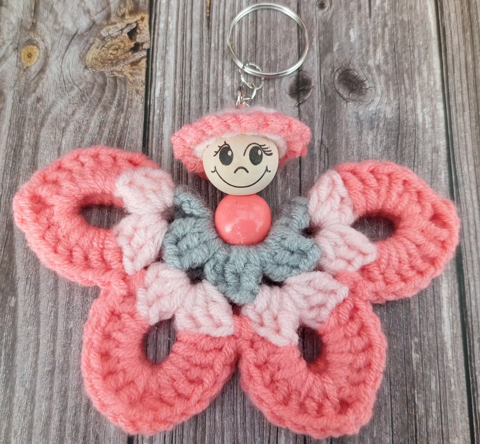 Porte clé papillon gris/rose/saumon