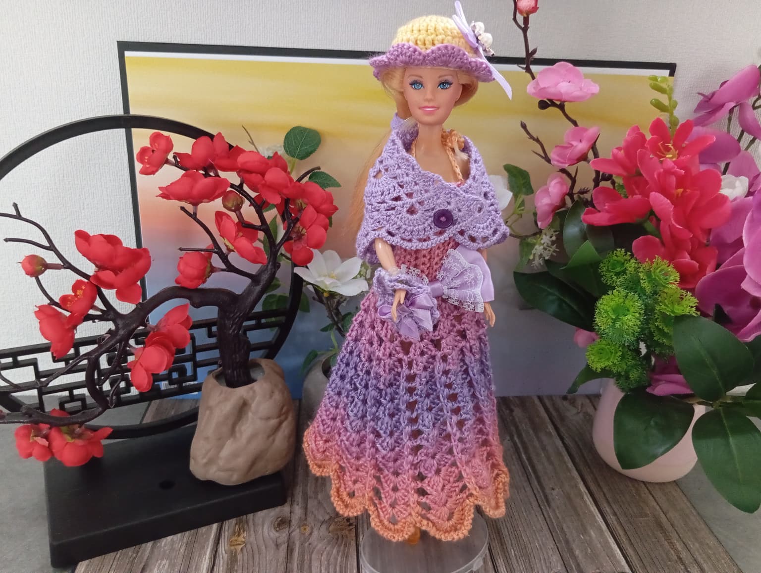 Robe rose/mauve pour poupée type Barbie