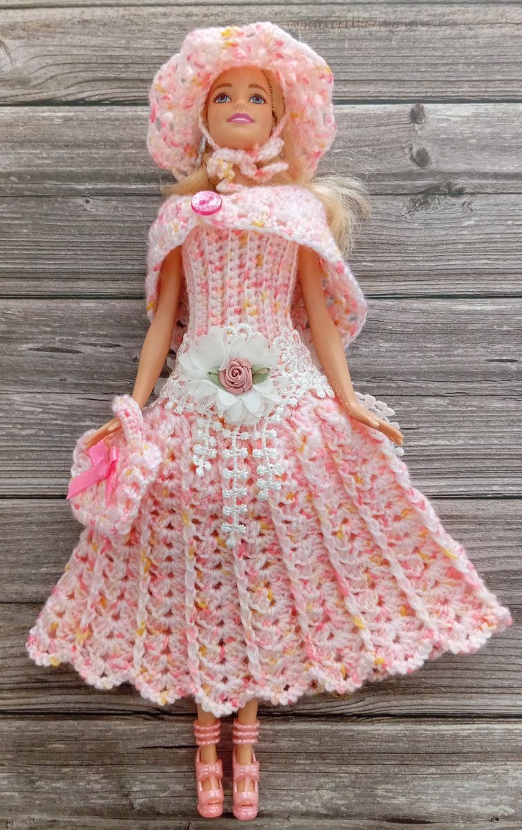 Robe rose pour poupée type Barbie