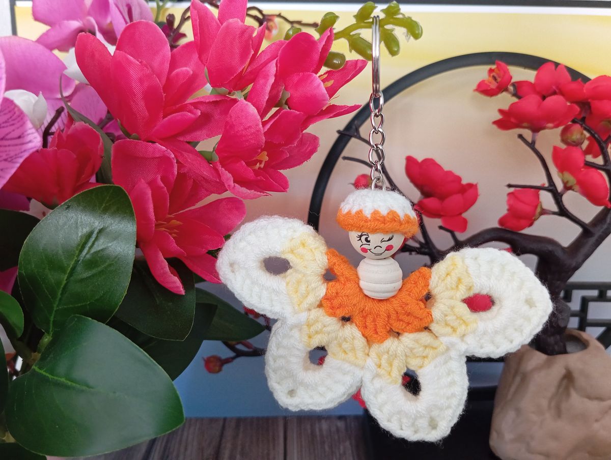 Porte clé papillon orange/jaune/blanc