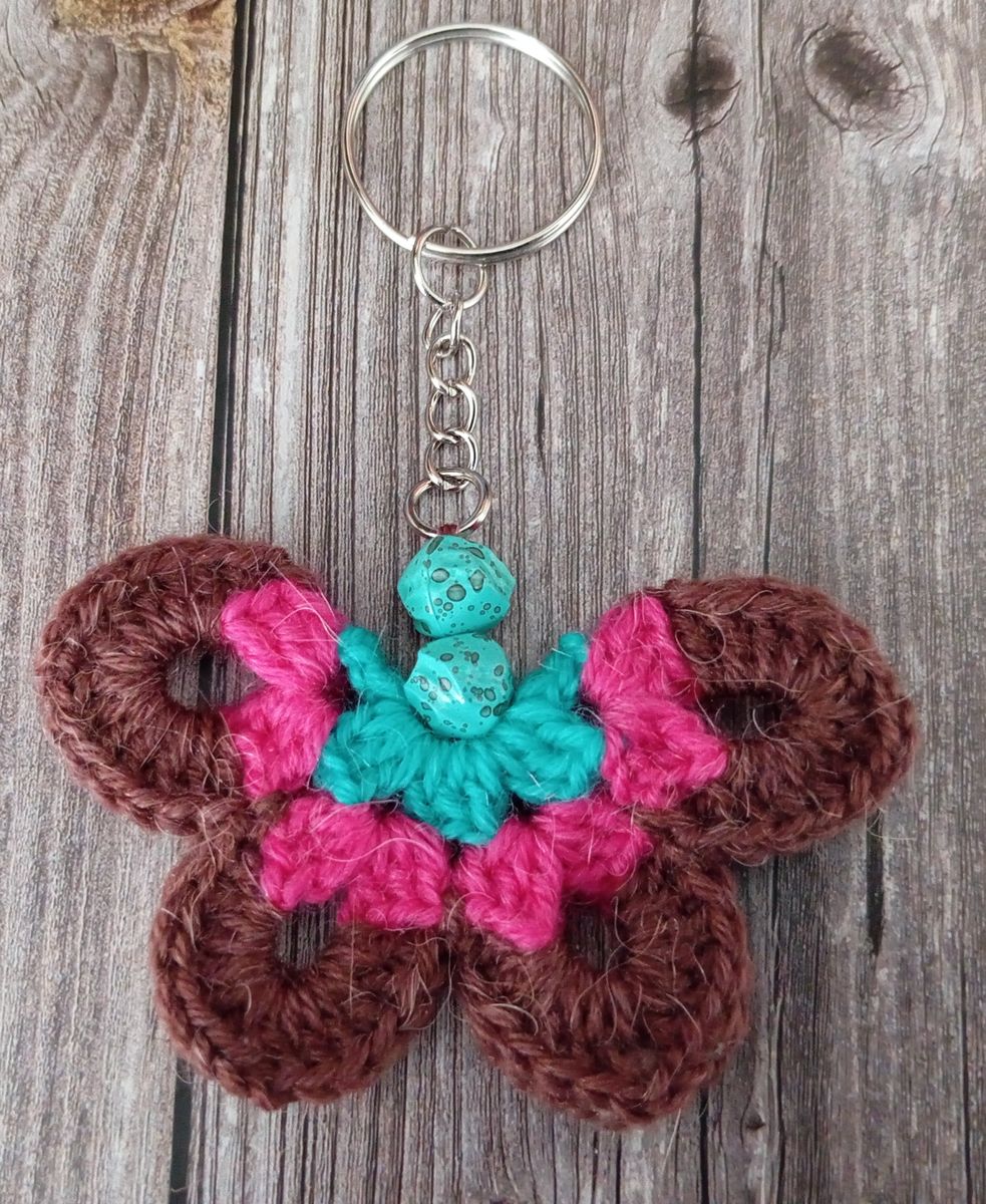 Porte clé papillon marron/fuchsia/vert