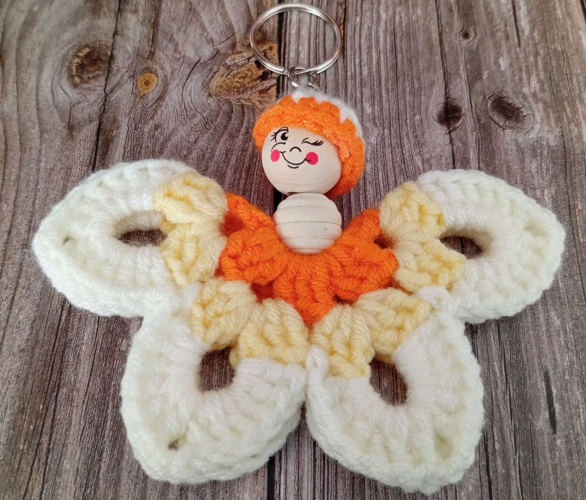 Porte clé papillon orange/jaune/blanc