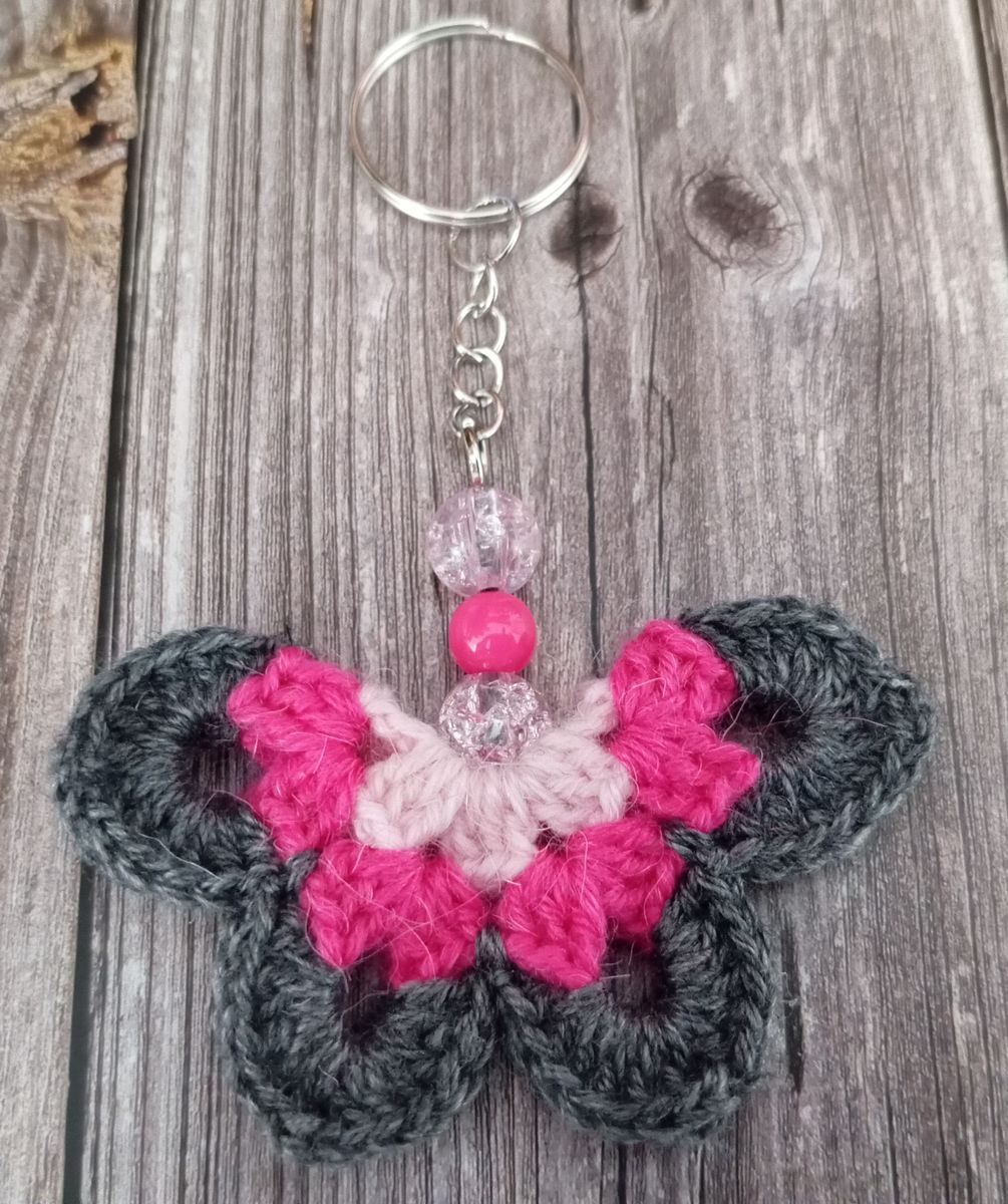 Porte clé papillon gris/fuchsia/rose