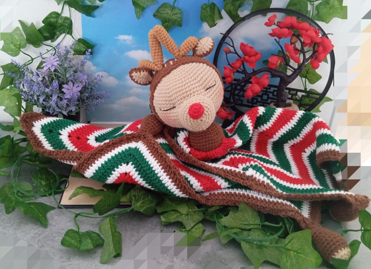 Doudou endormi Renne de Noël