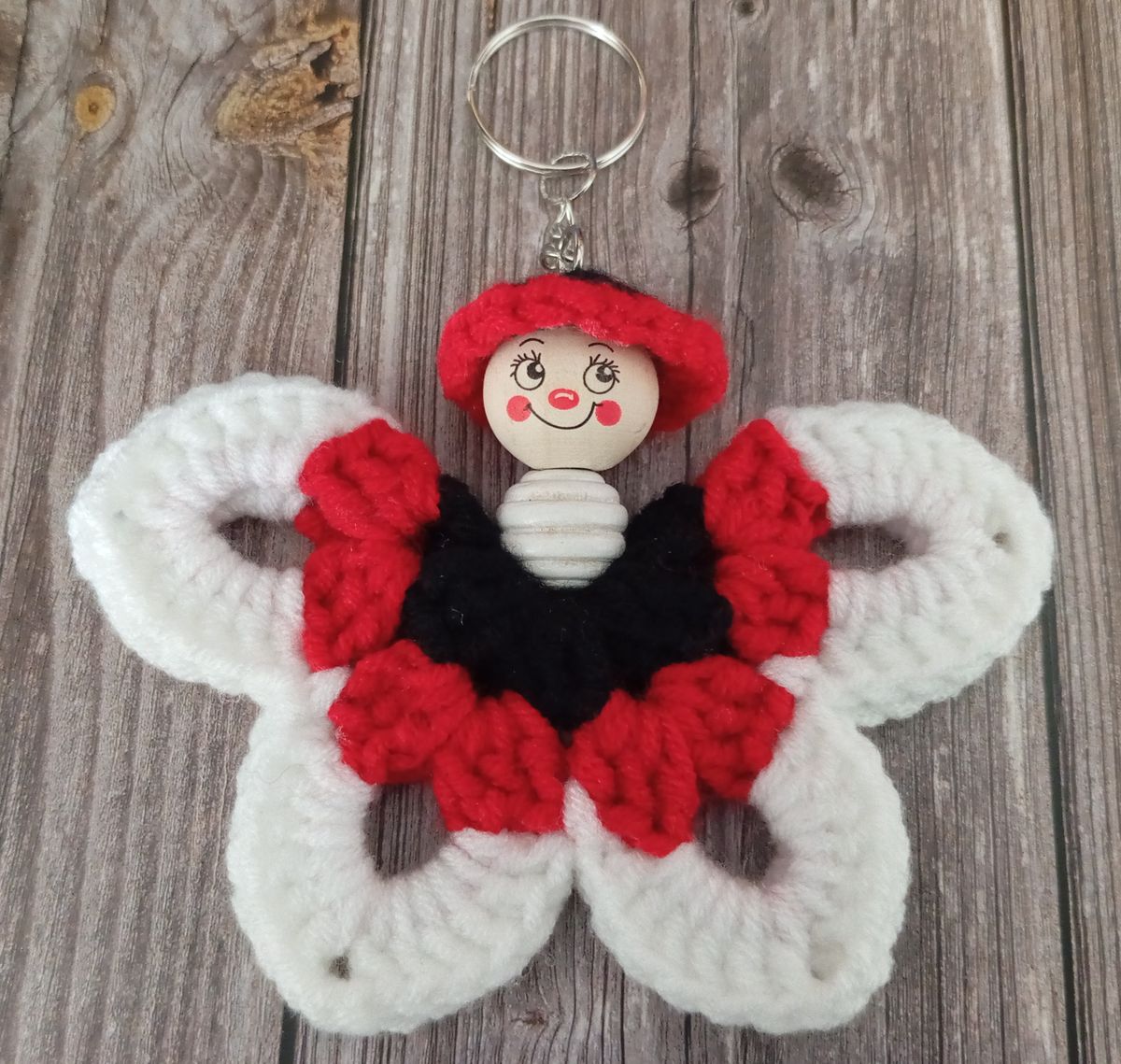 Porte clé papillon noir/rouge/blanc