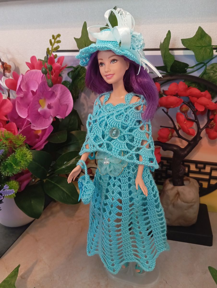 Robe turquoise pour poupée type Barbie