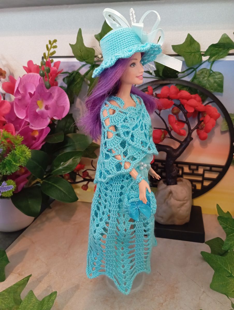 Robe turquoise pour poupée type Barbie