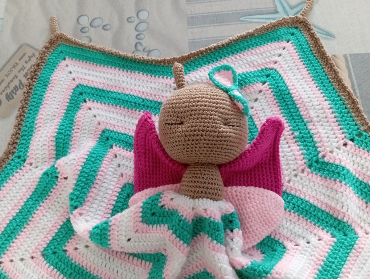 Doudou endormi Papillon