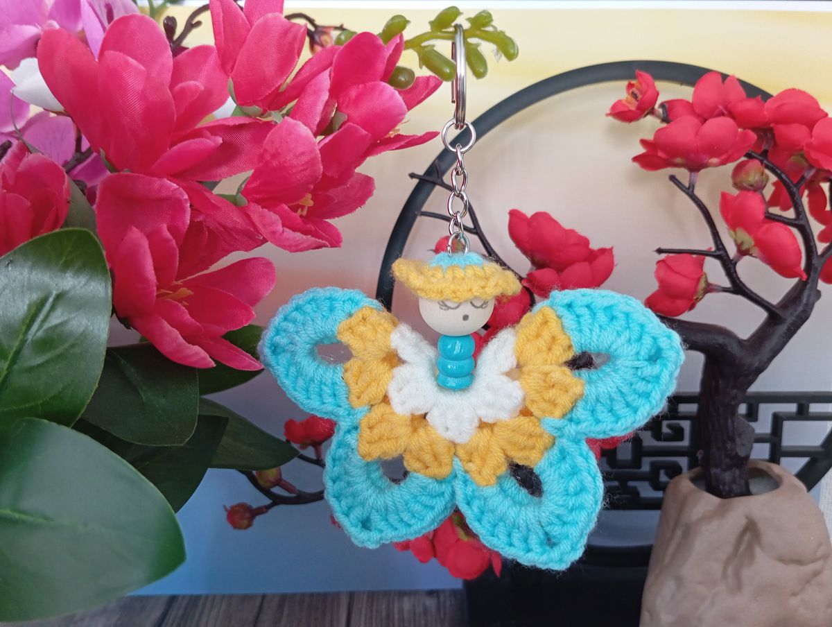 Porte clé papillon bleu/jaune/blanc