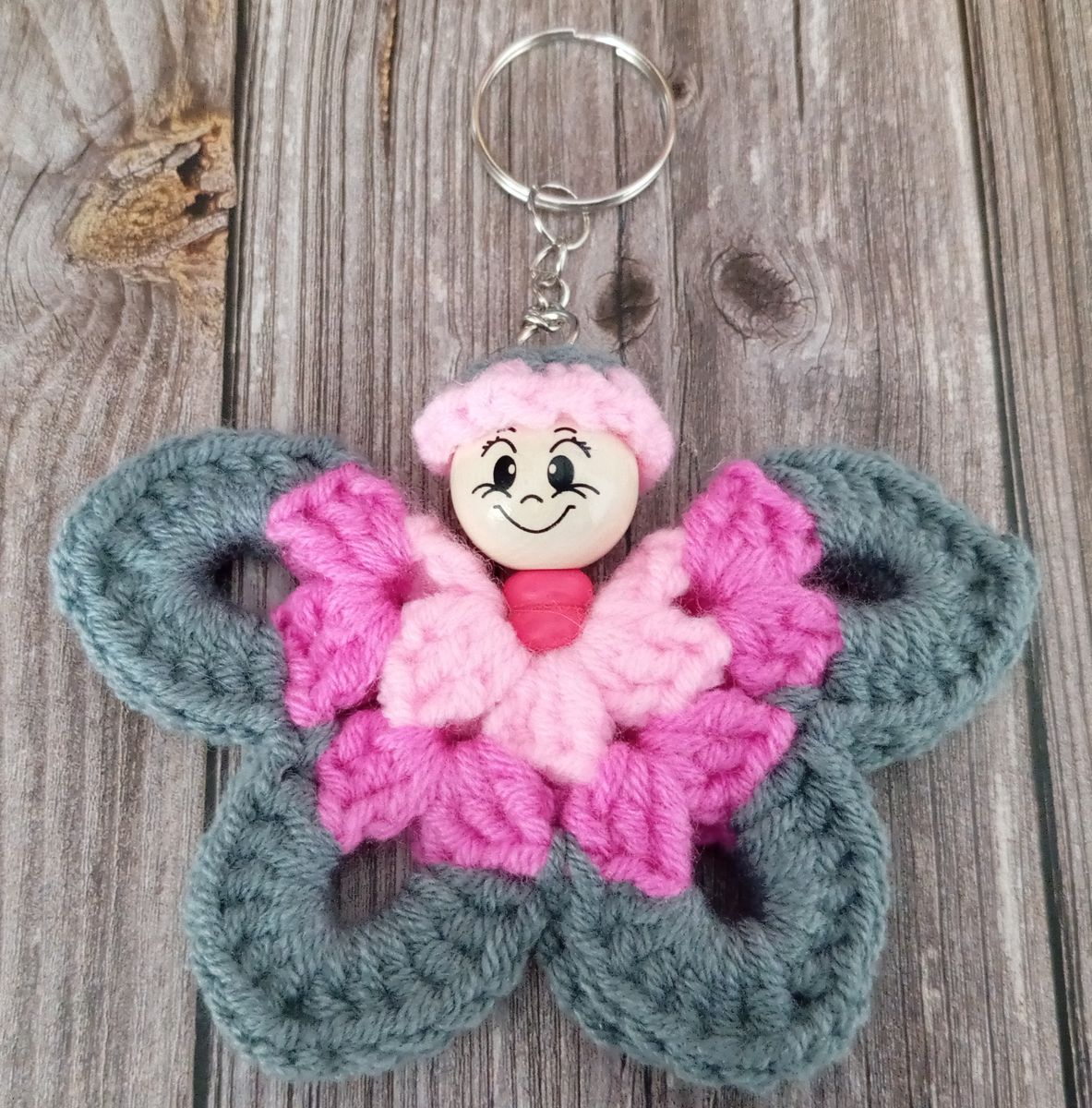 Porte clé papillon gris/rose