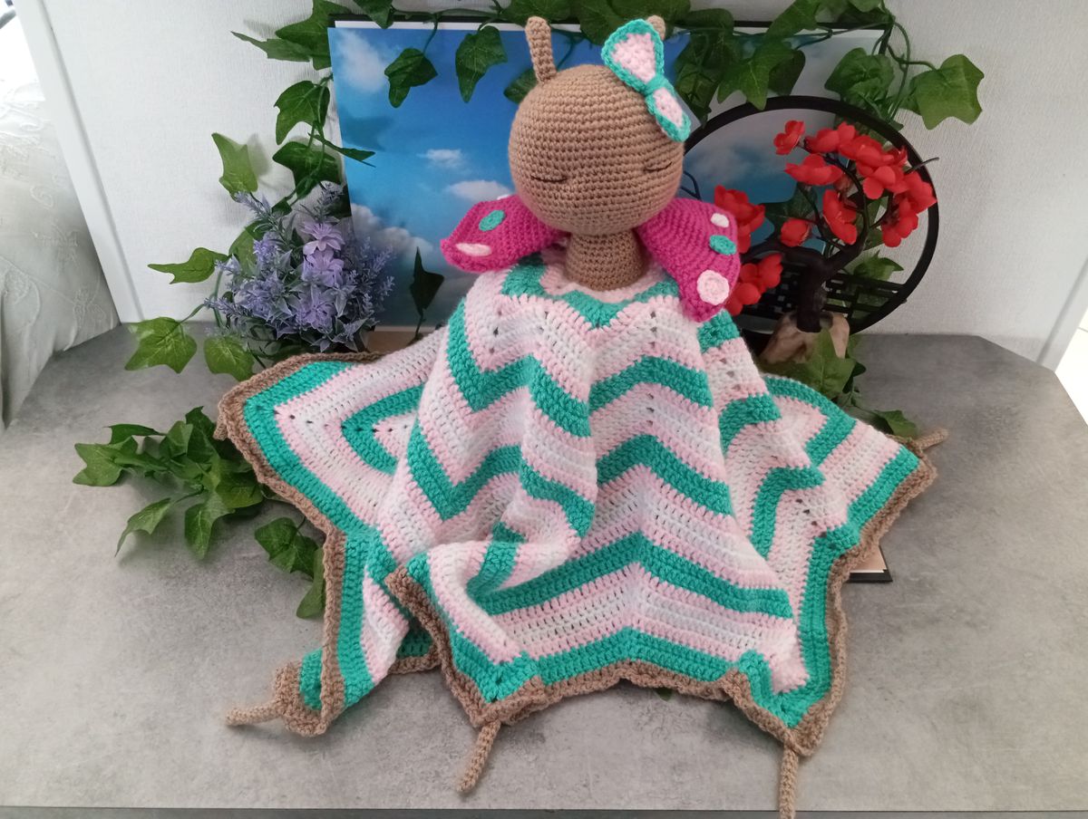 Doudou endormi Papillon
