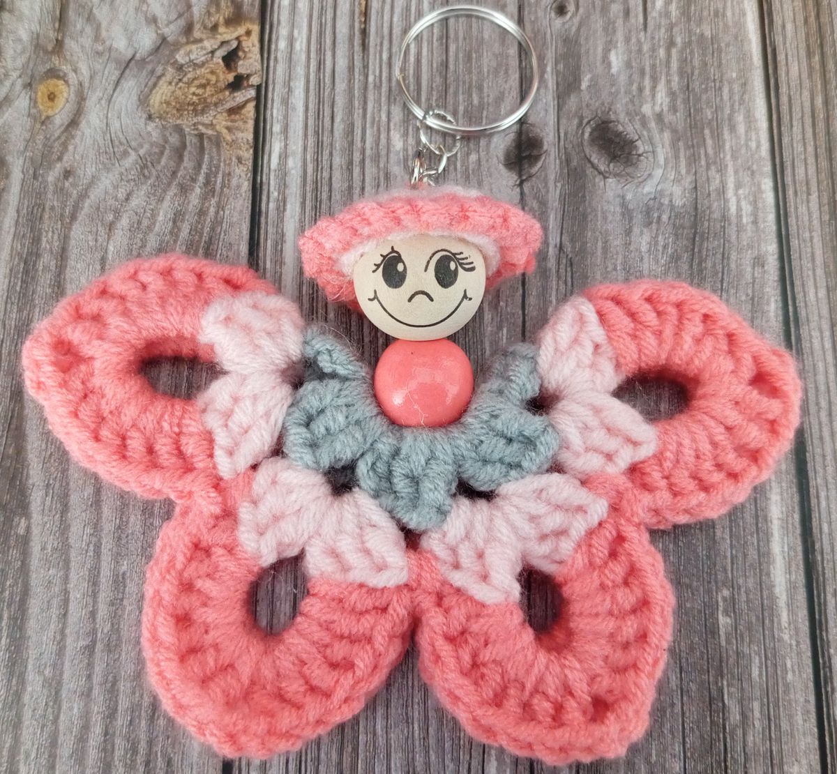 Porte clé papillon gris/rose/saumon